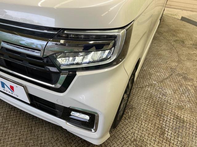 N-BOXカスタム L 禁煙車 ナビTV 両側電動ドア バックカメラ ホンダセンシング 渋滞追従アダプティブクルーズ リアパーキングセンサ 電動パーキングブレーキ シートヒーター 後席サンシェード DVD再生(53枚目)