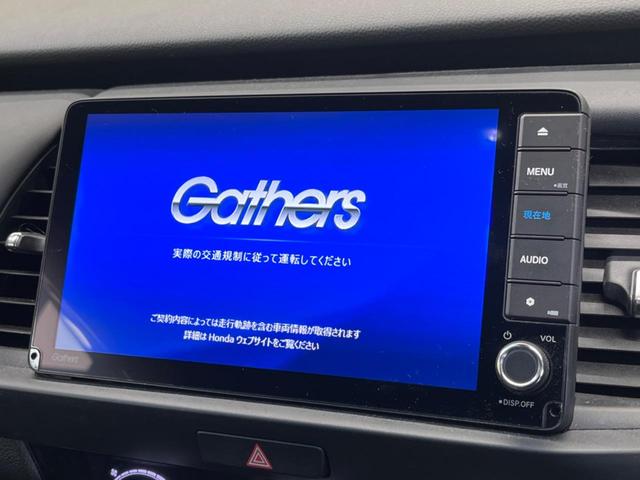 フィット ｅ：ＨＥＶホーム　禁煙車　純正９型ナビＴＶ　バックカメラ　ホンダセンシング　ＬＥＤヘッド　純正ＯＰ１６インチＡＷ　アダプティブクルーズ　パーキングセンサ　半革シート　ＥＴＣ　Ｂｌｕｅｔｏｏｔｈ　革巻ステアリング（3枚目）