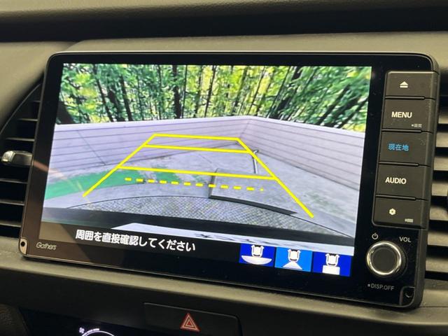 フィット ｅ：ＨＥＶホーム　禁煙車　純正９型ナビＴＶ　バックカメラ　ホンダセンシング　ＬＥＤヘッド　純正ＯＰ１６インチＡＷ　アダプティブクルーズ　パーキングセンサ　半革シート　ＥＴＣ　Ｂｌｕｅｔｏｏｔｈ　革巻ステアリング（4枚目）