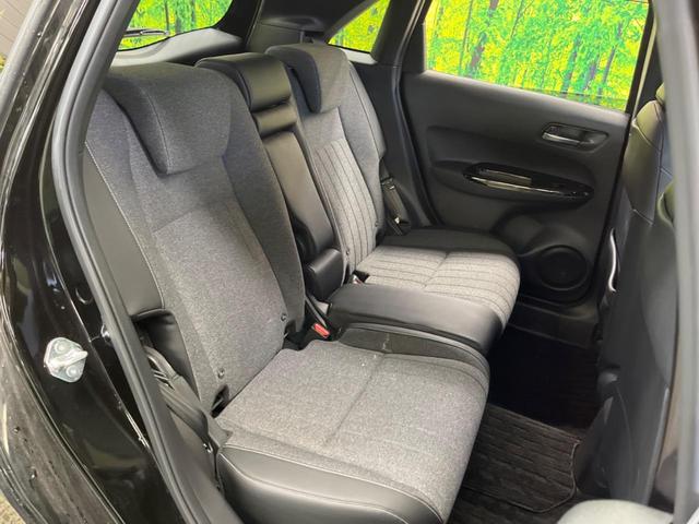 フィット ｅ：ＨＥＶホーム　禁煙車　純正９型ナビＴＶ　バックカメラ　ホンダセンシング　ＬＥＤヘッド　純正ＯＰ１６インチＡＷ　アダプティブクルーズ　パーキングセンサ　半革シート　ＥＴＣ　Ｂｌｕｅｔｏｏｔｈ　革巻ステアリング（10枚目）