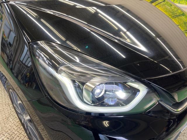 フィット ｅ：ＨＥＶホーム　禁煙車　純正９型ナビＴＶ　バックカメラ　ホンダセンシング　ＬＥＤヘッド　純正ＯＰ１６インチＡＷ　アダプティブクルーズ　パーキングセンサ　半革シート　ＥＴＣ　Ｂｌｕｅｔｏｏｔｈ　革巻ステアリング（12枚目）