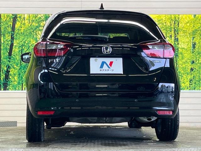 フィット ｅ：ＨＥＶホーム　禁煙車　純正９型ナビＴＶ　バックカメラ　ホンダセンシング　ＬＥＤヘッド　純正ＯＰ１６インチＡＷ　アダプティブクルーズ　パーキングセンサ　半革シート　ＥＴＣ　Ｂｌｕｅｔｏｏｔｈ　革巻ステアリング（15枚目）