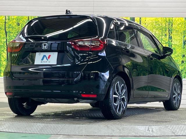 フィット ｅ：ＨＥＶホーム　禁煙車　純正９型ナビＴＶ　バックカメラ　ホンダセンシング　ＬＥＤヘッド　純正ＯＰ１６インチＡＷ　アダプティブクルーズ　パーキングセンサ　半革シート　ＥＴＣ　Ｂｌｕｅｔｏｏｔｈ　革巻ステアリング（17枚目）