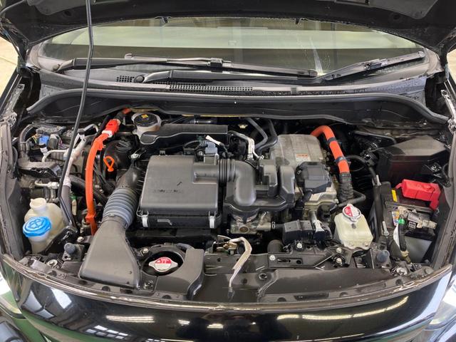 フィット ｅ：ＨＥＶホーム　禁煙車　純正９型ナビＴＶ　バックカメラ　ホンダセンシング　ＬＥＤヘッド　純正ＯＰ１６インチＡＷ　アダプティブクルーズ　パーキングセンサ　半革シート　ＥＴＣ　Ｂｌｕｅｔｏｏｔｈ　革巻ステアリング（19枚目）