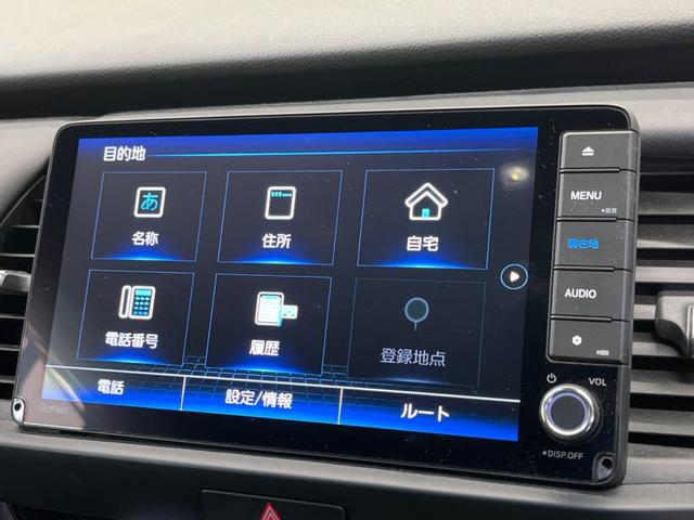 フィット ｅ：ＨＥＶホーム　禁煙車　純正９型ナビＴＶ　バックカメラ　ホンダセンシング　ＬＥＤヘッド　純正ＯＰ１６インチＡＷ　アダプティブクルーズ　パーキングセンサ　半革シート　ＥＴＣ　Ｂｌｕｅｔｏｏｔｈ　革巻ステアリング（22枚目）