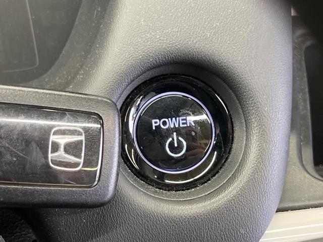 フィット ｅ：ＨＥＶホーム　禁煙車　純正９型ナビＴＶ　バックカメラ　ホンダセンシング　ＬＥＤヘッド　純正ＯＰ１６インチＡＷ　アダプティブクルーズ　パーキングセンサ　半革シート　ＥＴＣ　Ｂｌｕｅｔｏｏｔｈ　革巻ステアリング（24枚目）