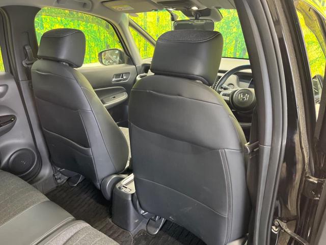 フィット ｅ：ＨＥＶホーム　禁煙車　純正９型ナビＴＶ　バックカメラ　ホンダセンシング　ＬＥＤヘッド　純正ＯＰ１６インチＡＷ　アダプティブクルーズ　パーキングセンサ　半革シート　ＥＴＣ　Ｂｌｕｅｔｏｏｔｈ　革巻ステアリング（32枚目）