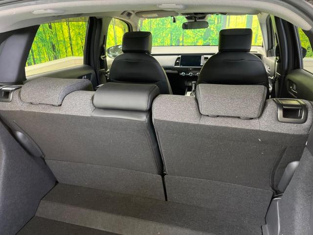 フィット ｅ：ＨＥＶホーム　禁煙車　純正９型ナビＴＶ　バックカメラ　ホンダセンシング　ＬＥＤヘッド　純正ＯＰ１６インチＡＷ　アダプティブクルーズ　パーキングセンサ　半革シート　ＥＴＣ　Ｂｌｕｅｔｏｏｔｈ　革巻ステアリング（33枚目）