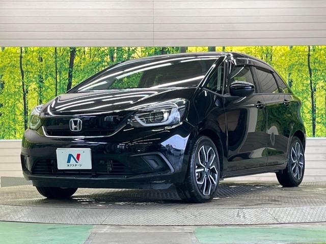 フィット ｅ：ＨＥＶホーム　禁煙車　純正９型ナビＴＶ　バックカメラ　ホンダセンシング　ＬＥＤヘッド　純正ＯＰ１６インチＡＷ　アダプティブクルーズ　パーキングセンサ　半革シート　ＥＴＣ　Ｂｌｕｅｔｏｏｔｈ　革巻ステアリング（46枚目）