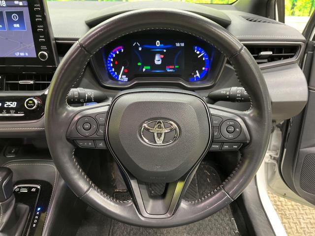 カローラツーリング ハイブリッド　ダブルバイビー　禁煙車　純正９型ナビ　バックカメラ　セーフティセンス　ブラインドスポットモニタ　シートヒーター　ステアリングヒーター　ＬＥＤデイライト　純正１７インチＡＷ　半革シート　ＡｐｐｌｅＣａｒＰｌａｙ　ＥＴＣ（5枚目）