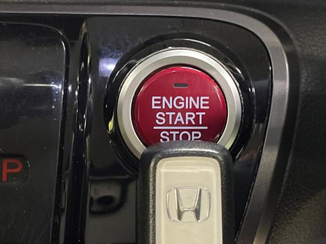 N-BOXカスタム 2トーンカラースタイル G・Lパッケージ 禁煙車 純正ナビフルセグ バックカメラ 両側電動ドア 衝突被害軽減システム ビルトインETC スマートキー HIDヘッド 純正14インチAW オートライト オートエアコン Bluetooth CD(30枚目)