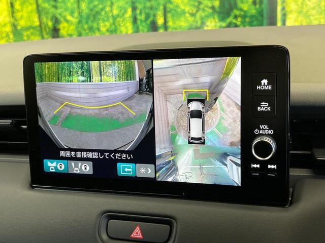 ヴェゼル ｅ：ＨＥＶ　ＲＳ　登録済未使用車　レーダークルーズ　純正９型ナビＴＶ　全周囲カメラ　衝突被害軽減　ブラインドスポットモニター　ハンズフリーパワーバックドア　ＬＥＤヘッド　オートハイビーム　シートヒーター　置くだけ充電（4枚目）
