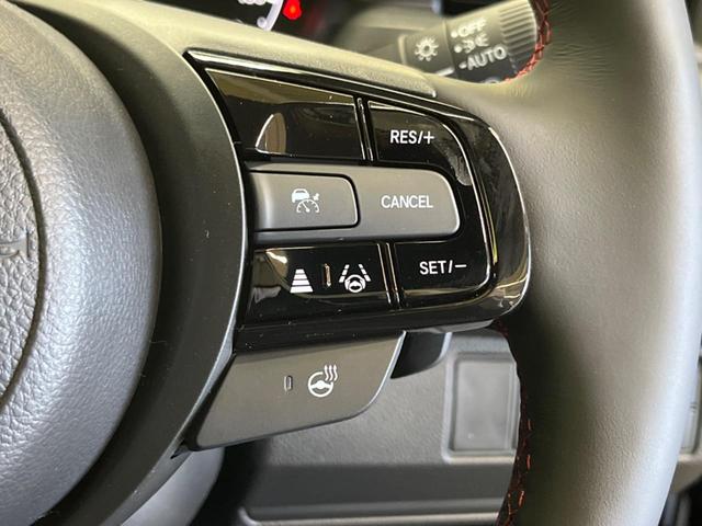 ヴェゼル ｅ：ＨＥＶ　ＲＳ　登録済未使用車　レーダークルーズ　純正９型ナビＴＶ　全周囲カメラ　衝突被害軽減　ブラインドスポットモニター　ハンズフリーパワーバックドア　ＬＥＤヘッド　オートハイビーム　シートヒーター　置くだけ充電（5枚目）