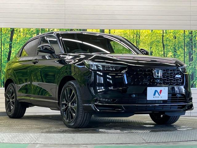 ヴェゼル ｅ：ＨＥＶ　ＲＳ　登録済未使用車　レーダークルーズ　純正９型ナビＴＶ　全周囲カメラ　衝突被害軽減　ブラインドスポットモニター　ハンズフリーパワーバックドア　ＬＥＤヘッド　オートハイビーム　シートヒーター　置くだけ充電（24枚目）