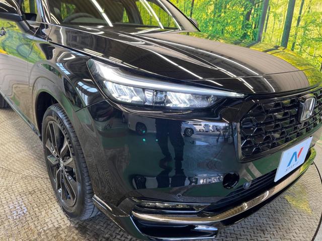 ヴェゼル ｅ：ＨＥＶ　ＲＳ　登録済未使用車　レーダークルーズ　純正９型ナビＴＶ　全周囲カメラ　衝突被害軽減　ブラインドスポットモニター　ハンズフリーパワーバックドア　ＬＥＤヘッド　オートハイビーム　シートヒーター　置くだけ充電（57枚目）