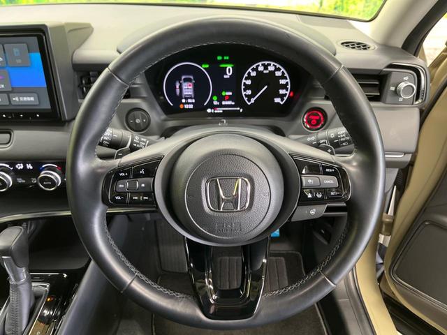 ヴェゼル ｅ：ＨＥＶ　Ｚ　禁煙車　９型ナビＴＶ　バックカメラ　ホンダセンシング　渋滞追従アダプティブクルーズ　ブラインドスポットインフォメーション　純正１８インチＡＷ　半革　シートヒーター　ハンズフリー電動バックドア　ＥＴＣ（5枚目）
