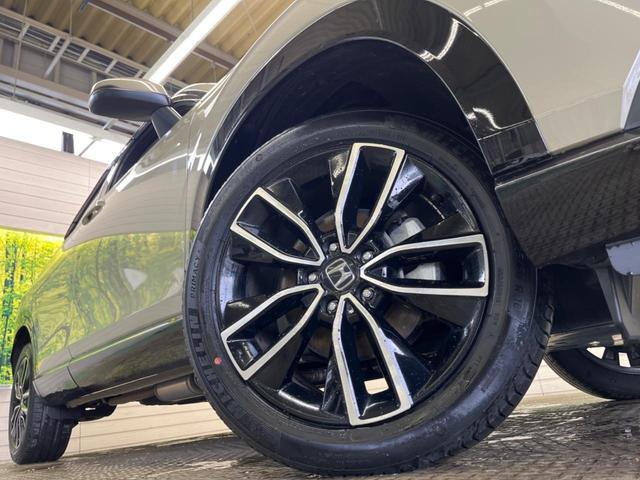 ヴェゼル ｅ：ＨＥＶ　Ｚ　禁煙車　９型ナビＴＶ　バックカメラ　ホンダセンシング　渋滞追従アダプティブクルーズ　ブラインドスポットインフォメーション　純正１８インチＡＷ　半革　シートヒーター　ハンズフリー電動バックドア　ＥＴＣ（13枚目）