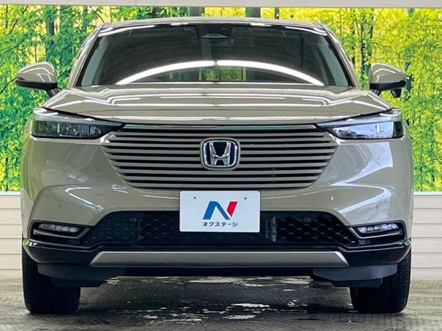 ヴェゼル ｅ：ＨＥＶ　Ｚ　禁煙車　９型ナビＴＶ　バックカメラ　ホンダセンシング　渋滞追従アダプティブクルーズ　ブラインドスポットインフォメーション　純正１８インチＡＷ　半革　シートヒーター　ハンズフリー電動バックドア　ＥＴＣ（14枚目）