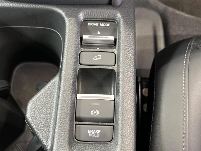 ヴェゼル ｅ：ＨＥＶ　Ｚ　禁煙車　９型ナビＴＶ　バックカメラ　ホンダセンシング　渋滞追従アダプティブクルーズ　ブラインドスポットインフォメーション　純正１８インチＡＷ　半革　シートヒーター　ハンズフリー電動バックドア　ＥＴＣ（24枚目）