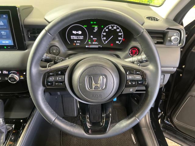 ヴェゼル ｅ：ＨＥＶ　Ｚ　禁煙車　純正８型ディスプレイ　バックカメラ　ホンダセンシング　渋滞追従アダプティブクルーズ　純正１８インチＡＷ　半革シート　シートヒーター　ハンズフリー電動バックドア　ＡｐｐｌｅＣａｒＰｌａｙ　ＥＴＣ（5枚目）