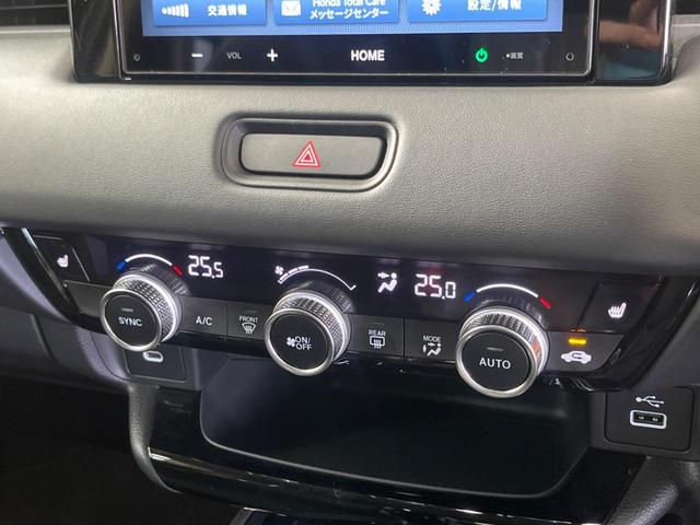 ヴェゼル ｅ：ＨＥＶ　Ｚ　禁煙車　純正８型ディスプレイ　バックカメラ　ホンダセンシング　渋滞追従アダプティブクルーズ　純正１８インチＡＷ　半革シート　シートヒーター　ハンズフリー電動バックドア　ＡｐｐｌｅＣａｒＰｌａｙ　ＥＴＣ（7枚目）