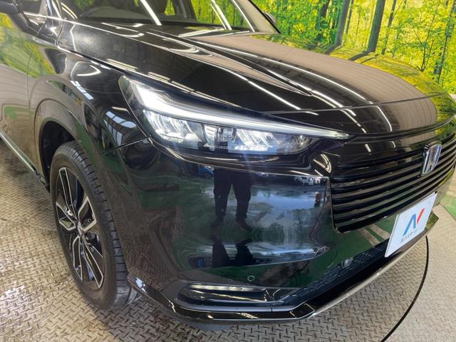 ヴェゼル ｅ：ＨＥＶ　Ｚ　禁煙車　純正８型ディスプレイ　バックカメラ　ホンダセンシング　渋滞追従アダプティブクルーズ　純正１８インチＡＷ　半革シート　シートヒーター　ハンズフリー電動バックドア　ＡｐｐｌｅＣａｒＰｌａｙ　ＥＴＣ（12枚目）