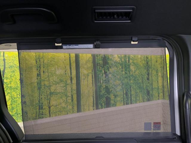 ヴォクシー ハイブリッドＳ－Ｚ　快適利便ＰＫＧ　禁煙車　純正１０．５型ナビＴＶ　純正１４型後席モニター　三眼ＬＥＤ　パノラミックビューモニタ　ブラインドスポットモニタ　前中列シートヒーター　電動バックドア　後席オットマン　ＤＶＤ再生（34枚目）
