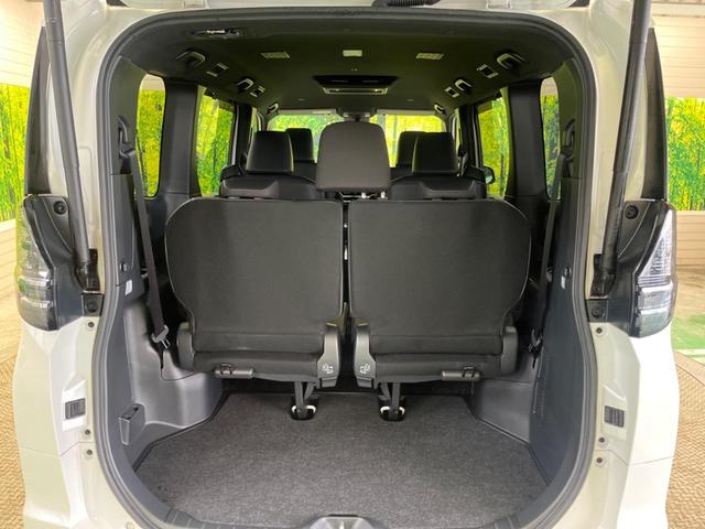 ヴォクシー ハイブリッドＳ－Ｚ　快適利便ＰＫＧ　禁煙車　純正１０．５型ナビＴＶ　純正１４型後席モニター　三眼ＬＥＤ　パノラミックビューモニタ　ブラインドスポットモニタ　前中列シートヒーター　電動バックドア　後席オットマン　ＤＶＤ再生（42枚目）