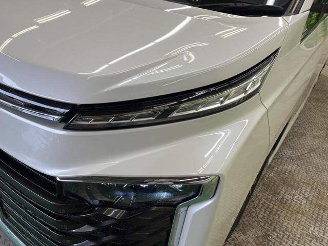 ヴォクシー ハイブリッドＳ－Ｚ　快適利便ＰＫＧ　禁煙車　純正１０．５型ナビＴＶ　純正１４型後席モニター　三眼ＬＥＤ　パノラミックビューモニタ　ブラインドスポットモニタ　前中列シートヒーター　電動バックドア　後席オットマン　ＤＶＤ再生（61枚目）