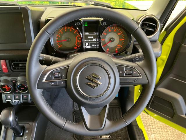 ジムニー ＸＣ　４ＷＤ　禁煙車　セーフティサポート　２トーンカラー　クルーズコントロール　ＬＥＤヘッド　シートヒーター　クリアランスソナー　スマートキー　オートマチックハイビーム　純正革巻ハンドル　純正１６インチＡＷ（11枚目）