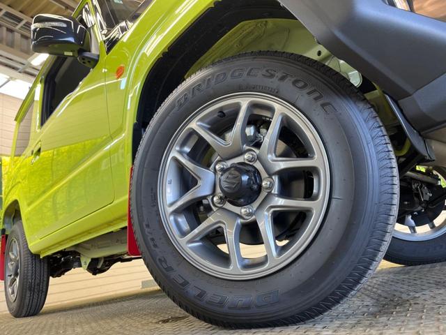 ジムニー ＸＣ　４ＷＤ　禁煙車　セーフティサポート　２トーンカラー　クルーズコントロール　ＬＥＤヘッド　シートヒーター　クリアランスソナー　スマートキー　オートマチックハイビーム　純正革巻ハンドル　純正１６インチＡＷ（13枚目）
