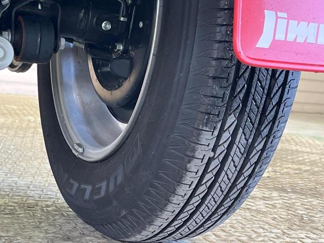 ジムニー ＸＣ　４ＷＤ　禁煙車　セーフティサポート　２トーンカラー　クルーズコントロール　ＬＥＤヘッド　シートヒーター　クリアランスソナー　スマートキー　オートマチックハイビーム　純正革巻ハンドル　純正１６インチＡＷ（21枚目）