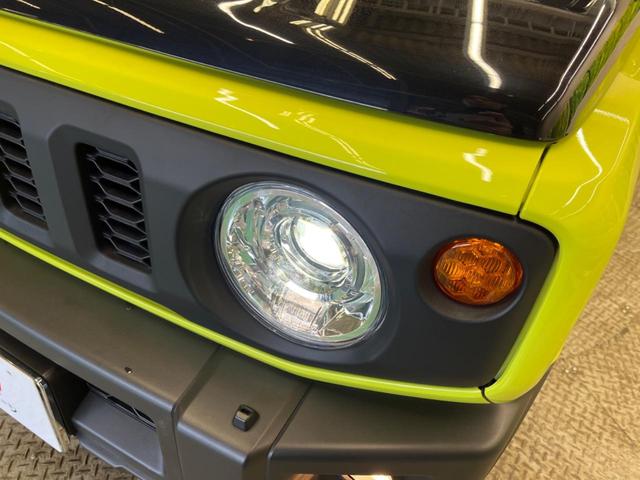 ジムニー ＸＣ　４ＷＤ　禁煙車　セーフティサポート　２トーンカラー　クルーズコントロール　ＬＥＤヘッド　シートヒーター　クリアランスソナー　スマートキー　オートマチックハイビーム　純正革巻ハンドル　純正１６インチＡＷ（30枚目）