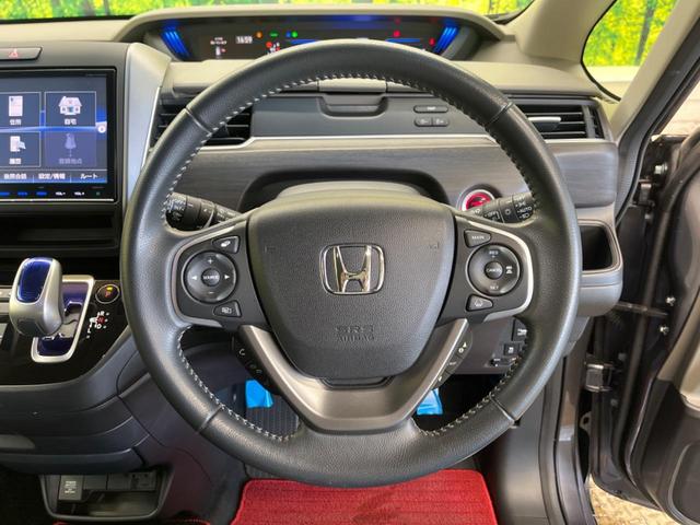 フリード＋ハイブリッド ハイブリッドＥＸ　禁煙車　純正９型ナビＴＶ　両側電動ドア　バックカメラ　ホンダセンシング　アダプティブクルーズ　ＬＥＤヘッド　純正１５インチＡＷ　半革シート　シートヒーター　革巻ステアリング　ＥＴＣ　ＤＶＤ再生（6枚目）