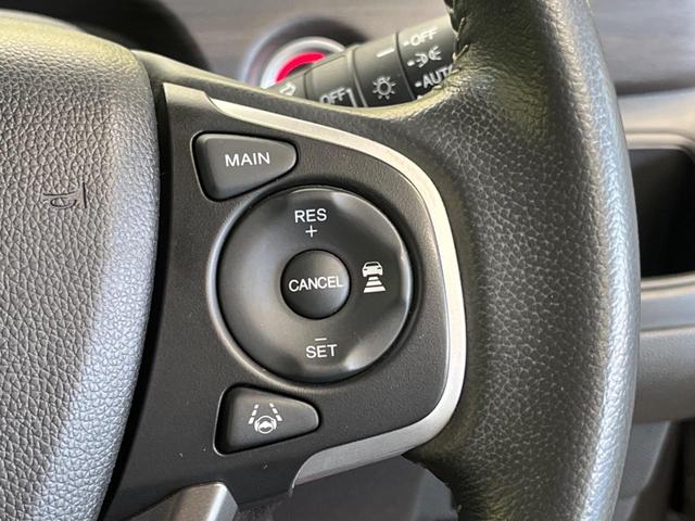 フリード＋ハイブリッド ハイブリッドＥＸ　禁煙車　純正９型ナビＴＶ　両側電動ドア　バックカメラ　ホンダセンシング　アダプティブクルーズ　ＬＥＤヘッド　純正１５インチＡＷ　半革シート　シートヒーター　革巻ステアリング　ＥＴＣ　ＤＶＤ再生（7枚目）