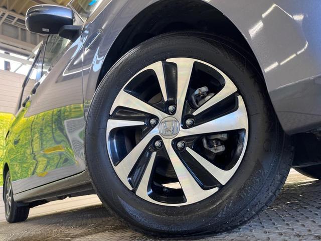 フリード＋ハイブリッド ハイブリッドＥＸ　禁煙車　純正９型ナビＴＶ　両側電動ドア　バックカメラ　ホンダセンシング　アダプティブクルーズ　ＬＥＤヘッド　純正１５インチＡＷ　半革シート　シートヒーター　革巻ステアリング　ＥＴＣ　ＤＶＤ再生（13枚目）