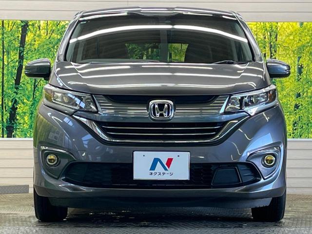 フリード＋ハイブリッド ハイブリッドＥＸ　禁煙車　純正９型ナビＴＶ　両側電動ドア　バックカメラ　ホンダセンシング　アダプティブクルーズ　ＬＥＤヘッド　純正１５インチＡＷ　半革シート　シートヒーター　革巻ステアリング　ＥＴＣ　ＤＶＤ再生（14枚目）