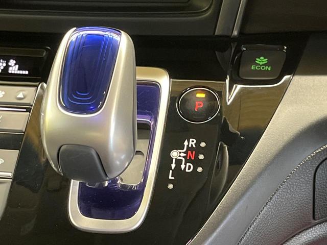フリード＋ハイブリッド ハイブリッドＥＸ　禁煙車　純正９型ナビＴＶ　両側電動ドア　バックカメラ　ホンダセンシング　アダプティブクルーズ　ＬＥＤヘッド　純正１５インチＡＷ　半革シート　シートヒーター　革巻ステアリング　ＥＴＣ　ＤＶＤ再生（21枚目）