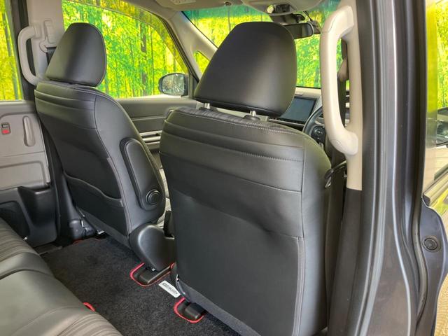 フリード＋ハイブリッド ハイブリッドＥＸ　禁煙車　純正９型ナビＴＶ　両側電動ドア　バックカメラ　ホンダセンシング　アダプティブクルーズ　ＬＥＤヘッド　純正１５インチＡＷ　半革シート　シートヒーター　革巻ステアリング　ＥＴＣ　ＤＶＤ再生（31枚目）