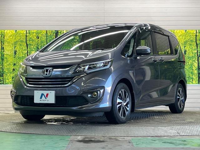 フリード＋ハイブリッド ハイブリッドＥＸ　禁煙車　純正９型ナビＴＶ　両側電動ドア　バックカメラ　ホンダセンシング　アダプティブクルーズ　ＬＥＤヘッド　純正１５インチＡＷ　半革シート　シートヒーター　革巻ステアリング　ＥＴＣ　ＤＶＤ再生（49枚目）