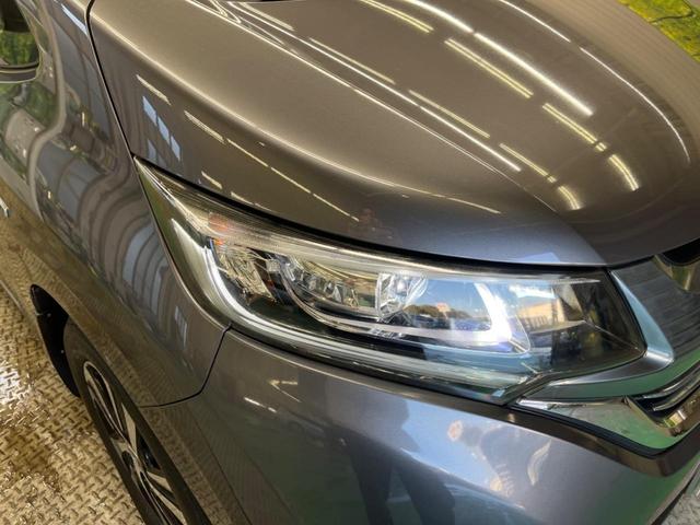 フリード＋ハイブリッド ハイブリッドＥＸ　禁煙車　純正９型ナビＴＶ　両側電動ドア　バックカメラ　ホンダセンシング　アダプティブクルーズ　ＬＥＤヘッド　純正１５インチＡＷ　半革シート　シートヒーター　革巻ステアリング　ＥＴＣ　ＤＶＤ再生（53枚目）