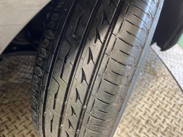 フリード＋ハイブリッド ハイブリッドＥＸ　禁煙車　純正９型ナビＴＶ　両側電動ドア　バックカメラ　ホンダセンシング　アダプティブクルーズ　ＬＥＤヘッド　純正１５インチＡＷ　半革シート　シートヒーター　革巻ステアリング　ＥＴＣ　ＤＶＤ再生（58枚目）