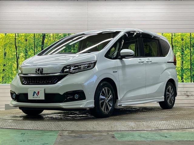 フリード＋ハイブリッド ハイブリッドＧ・ホンダセンシング　Ｓパッケージ　禁煙車　純正ナビフルセグ　両側電動ドア　バックカメラ　アダプティブクルーズ　ＬＥＤヘッド　純正ＯＰ１５インチＡＷ　半革シート　革巻ステアリング　ＥＴＣ　Ｂｌｕｅｔｏｏｔｈ　ＤＶＤ再生（48枚目）
