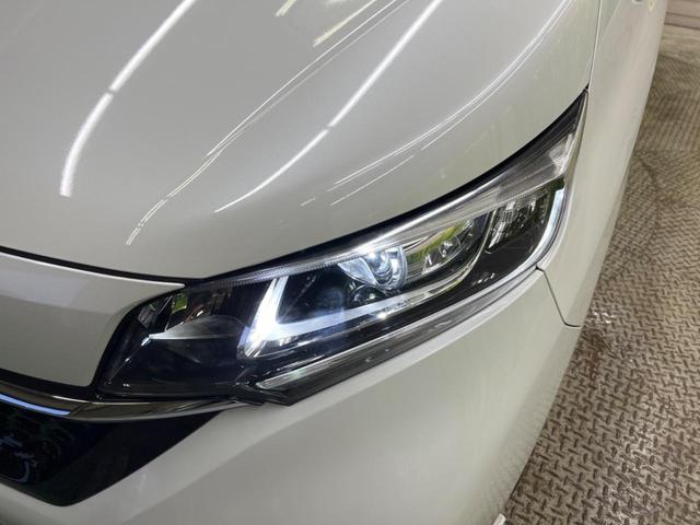 フリード＋ハイブリッド ハイブリッドＧ・ホンダセンシング　Ｓパッケージ　禁煙車　純正ナビフルセグ　両側電動ドア　バックカメラ　アダプティブクルーズ　ＬＥＤヘッド　純正ＯＰ１５インチＡＷ　半革シート　革巻ステアリング　ＥＴＣ　Ｂｌｕｅｔｏｏｔｈ　ＤＶＤ再生（54枚目）
