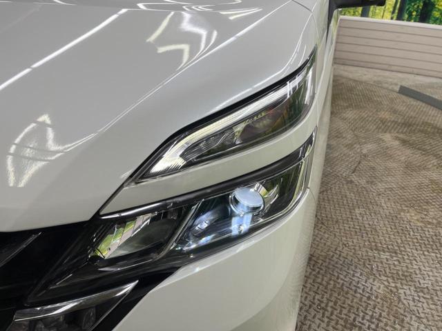 セレナ ハイウェイスター VセレクションII セーフティパックB 禁煙車 純正9型ナビTV 純正11型後席モニター アラウンドビューモニタ 両側ハンズフリー電動ドア プロパイロット 電動パーキングブレーキ 後席オートエアコン ブルーレイ再生(63枚目)