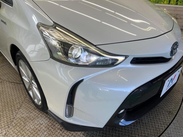 プリウスアルファ Ｓツーリングセレクション　禁煙車　純正ナビフルセグ　バックカメラ　ＬＥＤヘッド　純正１７インチＡＷ　スマートキー　オートエアコン　ＥＴＣ　Ｂｌｕｅｔｏｏｔｈ　ＬＥＤフォグ　革巻ステアリング　６スピーカー　ＤＶＤ再生（11枚目）