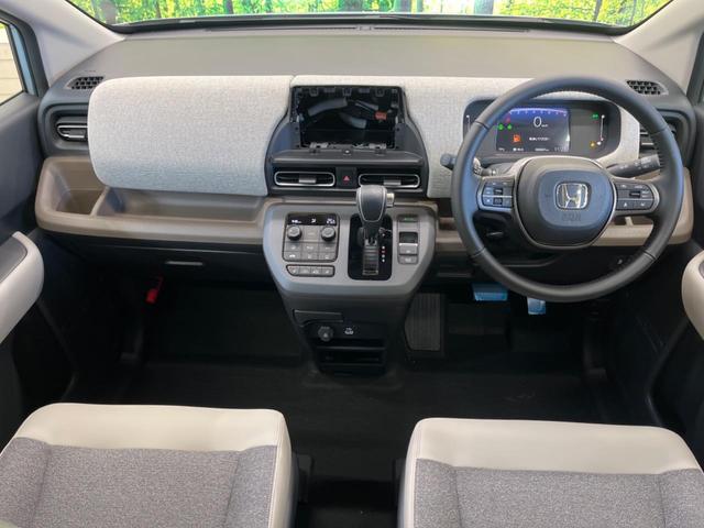 フリード エアー　ＥＸ　登録済未使用車　７人乗　ホンダセンシング　渋滞追従アダプティブクルーズ　パーキングセンサ　両側電動ドア　ＬＥＤヘッド　純正１５インチＡＷ　半革シート　シートヒーター　リアクーラー　革巻ステアリング（2枚目）