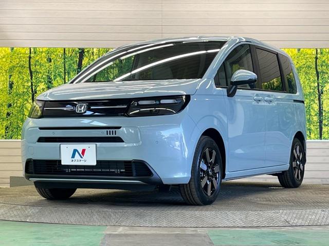 フリード エアー　ＥＸ　登録済未使用車　７人乗　ホンダセンシング　渋滞追従アダプティブクルーズ　パーキングセンサ　両側電動ドア　ＬＥＤヘッド　純正１５インチＡＷ　半革シート　シートヒーター　リアクーラー　革巻ステアリング（22枚目）