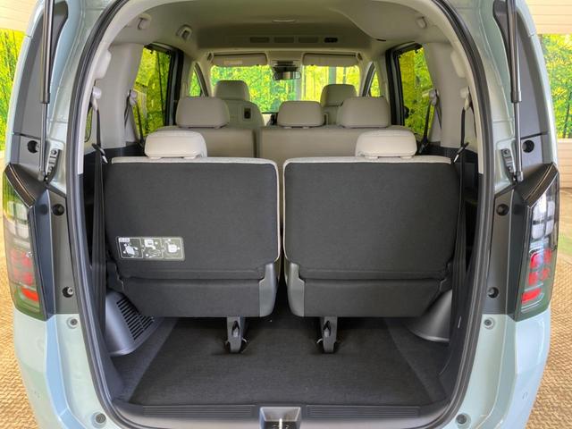 フリード エアー　ＥＸ　登録済未使用車　７人乗　ホンダセンシング　渋滞追従アダプティブクルーズ　パーキングセンサ　両側電動ドア　ＬＥＤヘッド　純正１５インチＡＷ　半革シート　シートヒーター　リアクーラー　革巻ステアリング（30枚目）