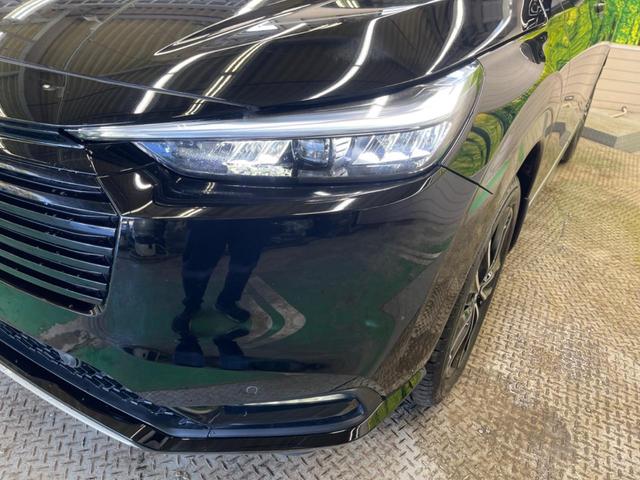 ヴェゼル ｅ：ＨＥＶ　Ｚ　禁煙車　純正８型ディスプレイオーディオ　バックカメラ　ホンダセンシング　渋滞追従アダプティブクルーズ　ハンズフリー電動バックドア　半革シート　シートヒーター　ＡｐｐｌｅＣａｒＰｌａｙ　ＥＴＣ（12枚目）